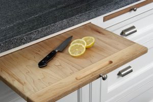 cutting board in white kitchen