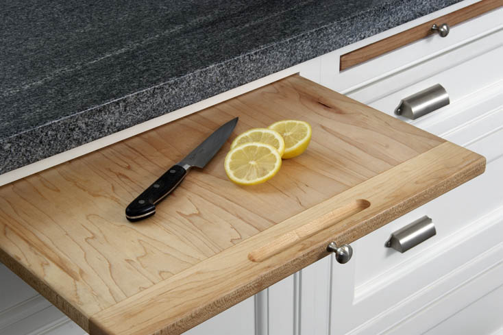 cutting board in white kitchen